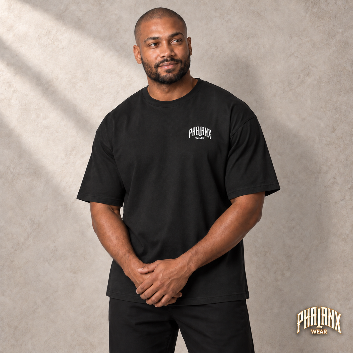 Phalanx Oversized Unisex Boxy T-Shirt – Schwarz – Malik · vorne